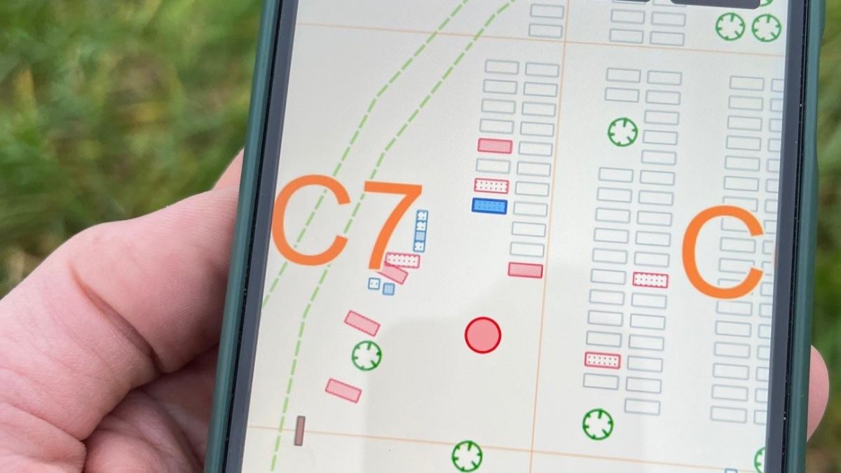 Close up of map of the burial ground on a phone.