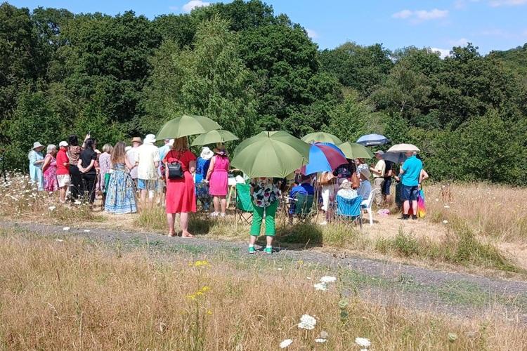 Image of a funeral taking place at Alne Wood Park